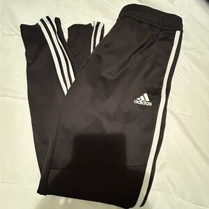 Adidas athletic black pants. Zippers on ankles. Size small. Great condition.